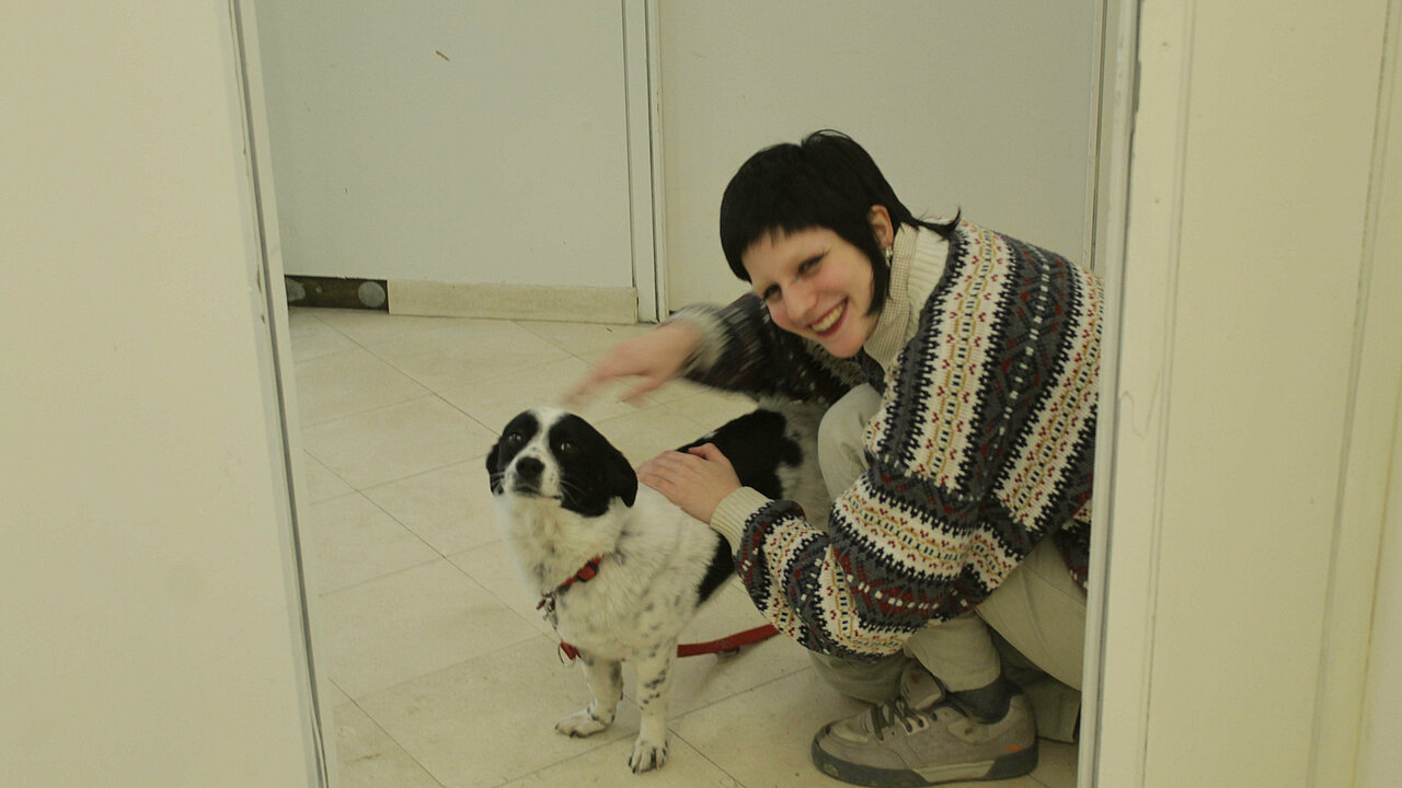 Portrait of Lana Lephamer with dog